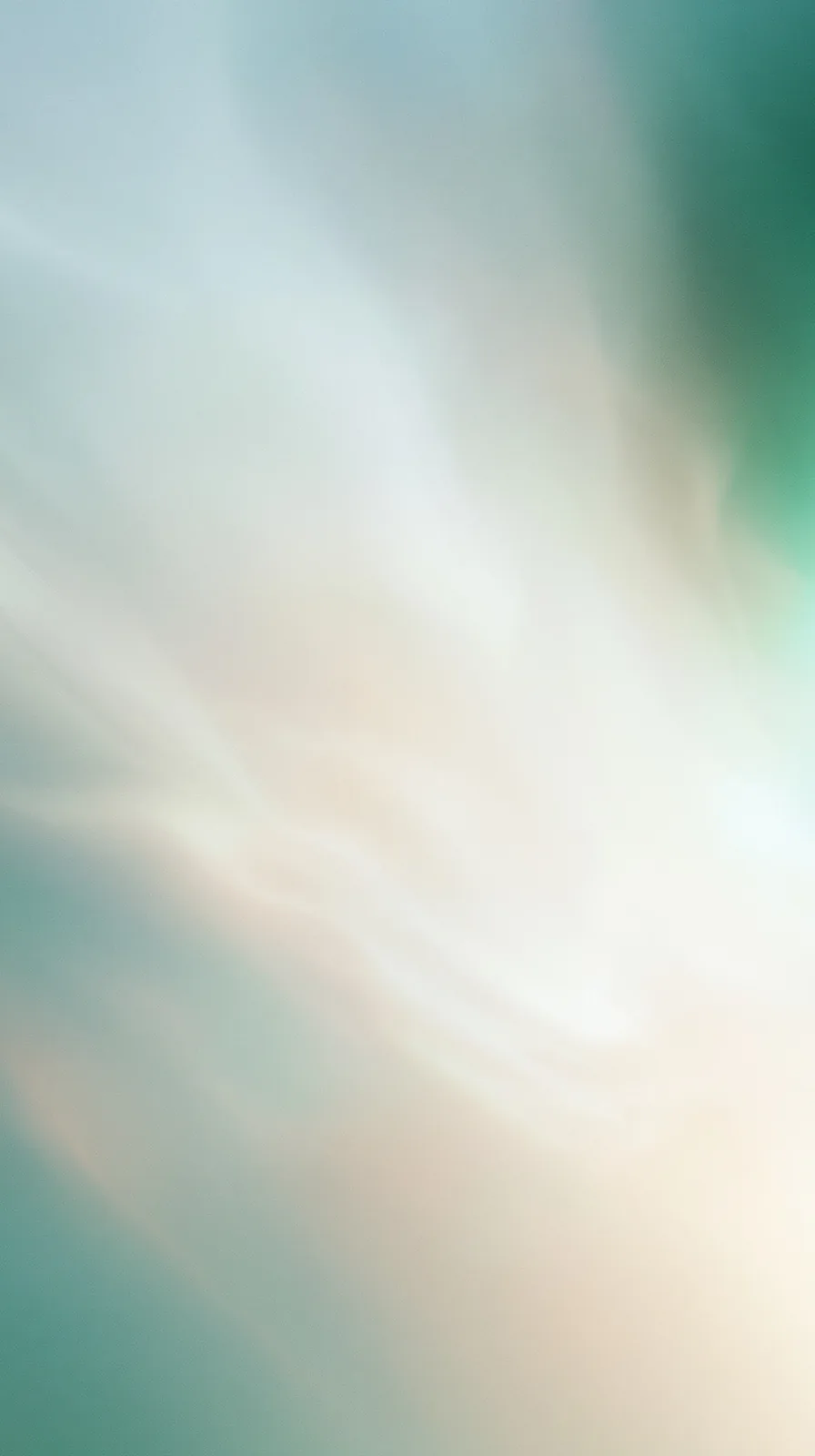 Abstract background in soft blue-green tones